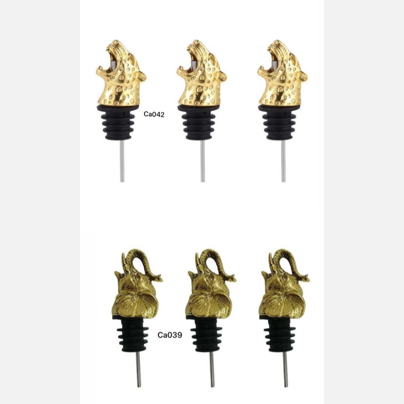 Dispensador de botellas metalico elefante dorado 10.5cm* 4cm