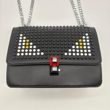 Bolso negro apliques ojos blanco cadena plateado 22cm* 9cm* 17cm C-23196