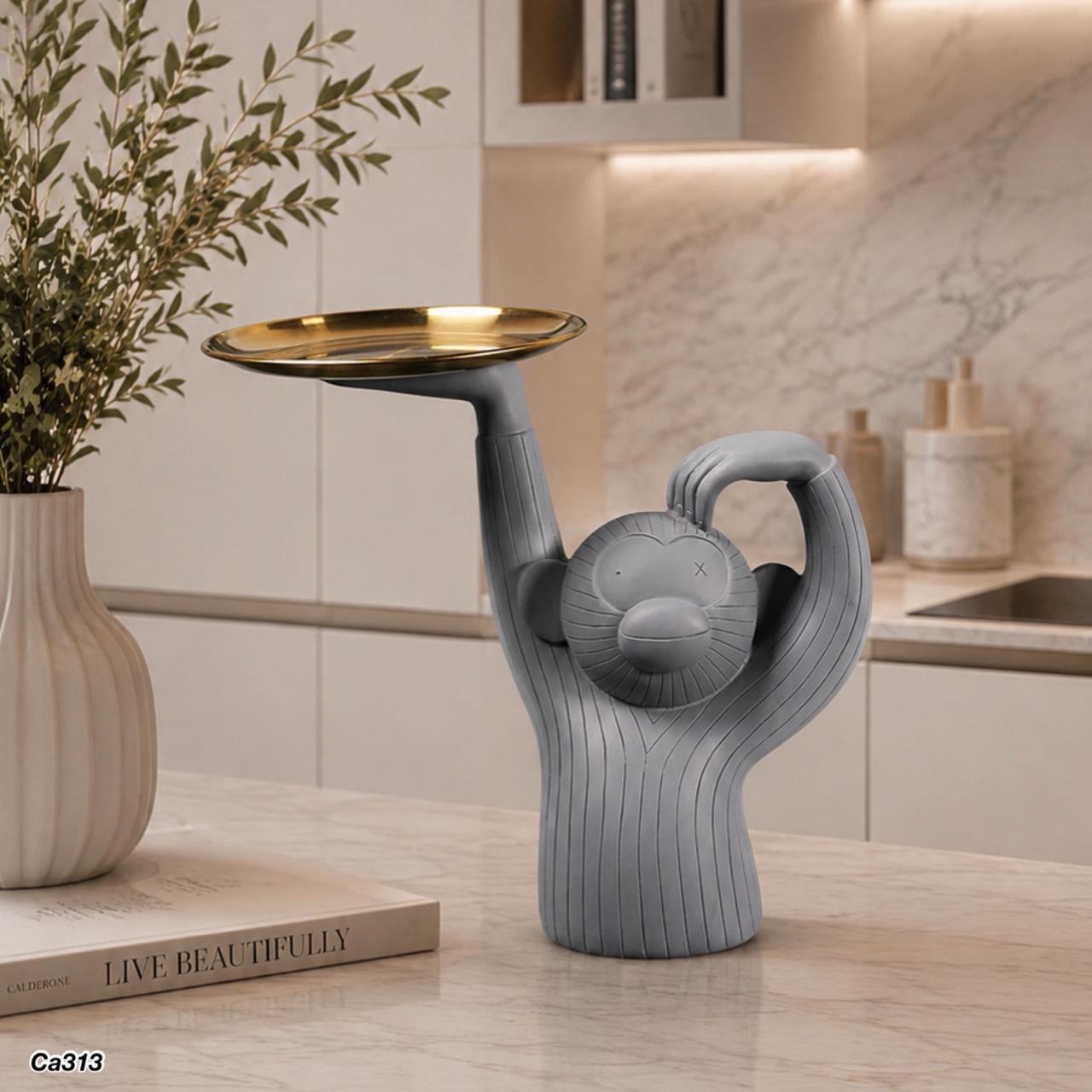 Articulo decorativo mono resina gris bandeja dorada 28,5cm* 14cm* 30cm