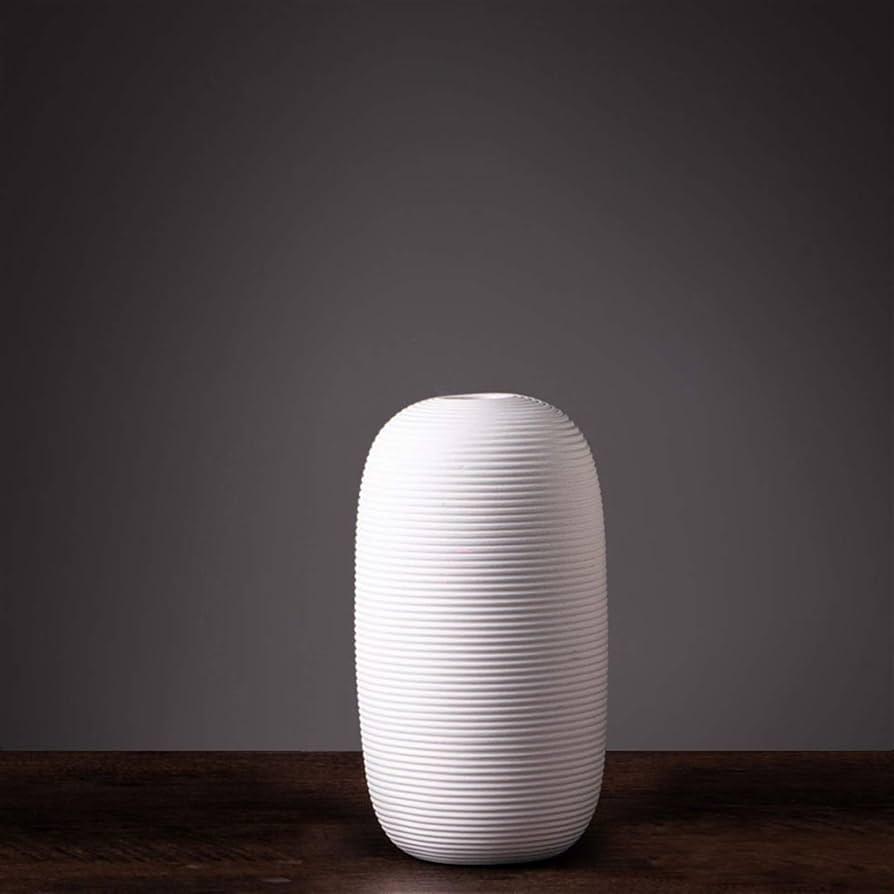 Jarron florero de ceramica blanco en espiral mediano 10cm* 10cm* 20cm