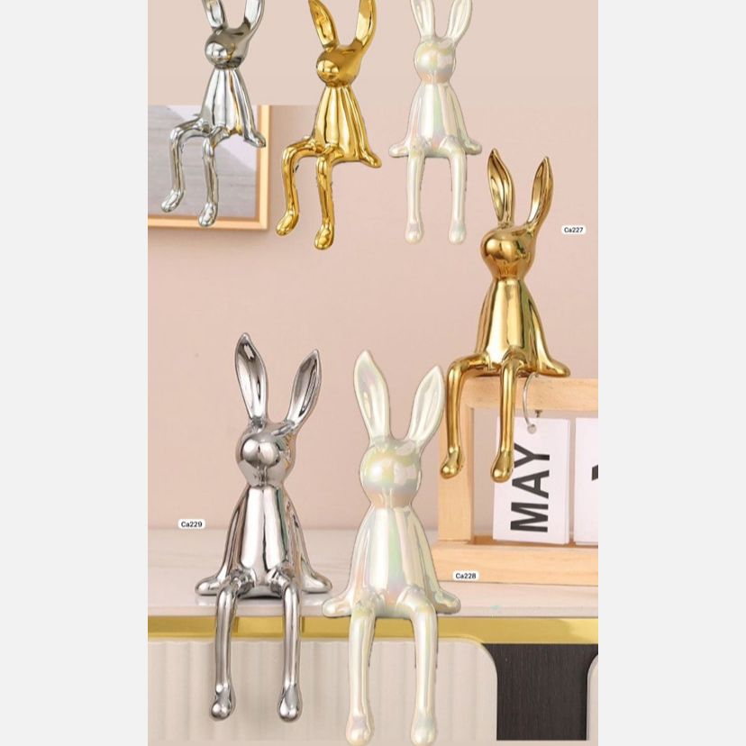 Articulo decorativo conejo dorado pequeño 8cm* 10cm* 21cm