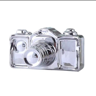 Articulo decorativo camara plateada ceramica 16cm* 11,7cm* 9cm