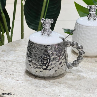Mugs plateado ceramica detalle oso en tapa manija bolas 430ml