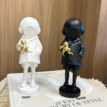 Articulo decorativo astronauta blanco pulpo dorado resina 10cm* 7,5cm* 23cm