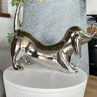 Articulo decorativo perro salchicha plateado 28cm* 22cm