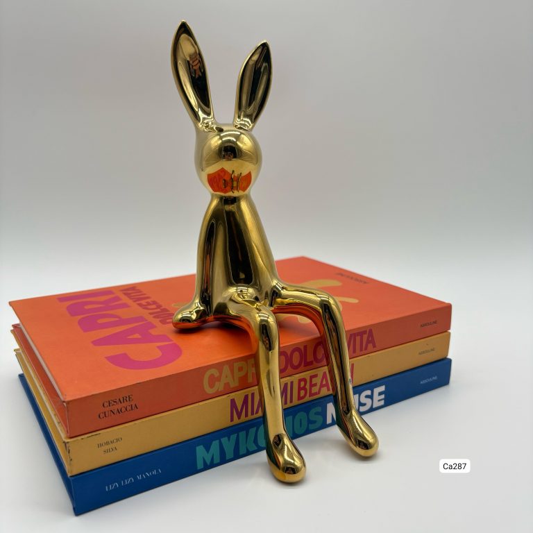 Articulo decorativo conejo dorado pequeño 8cm* 10cm* 21cm