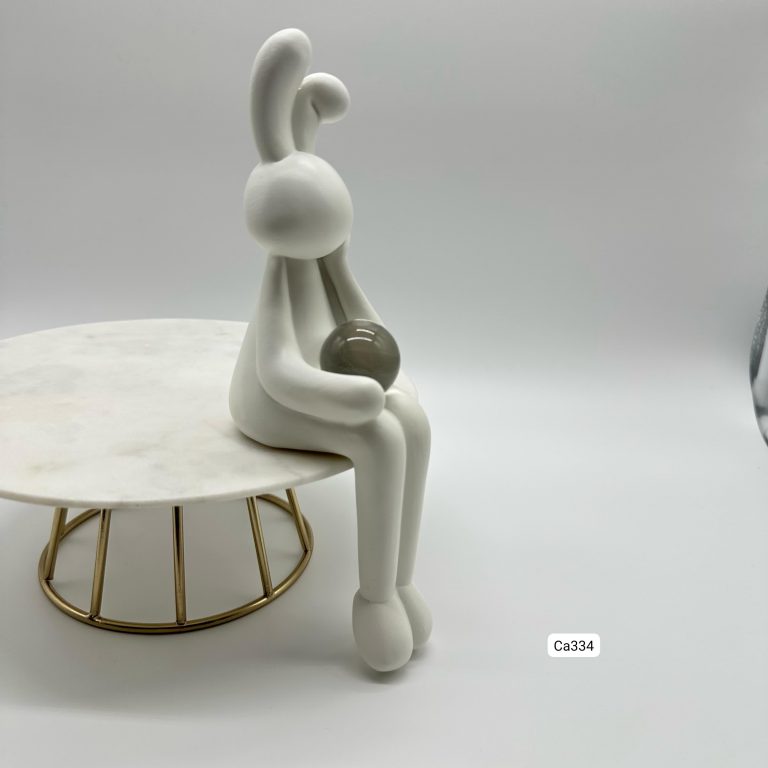 Articulo decorativo conejo blanco mano en la cara detalle bola cristal 5,5* 8,7* 22,4cm