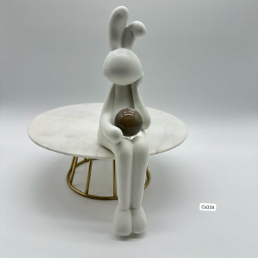 Articulo decorativo conejo blanco mano en la cara detalle bola cristal 5,5* 8,7* 22,4cm