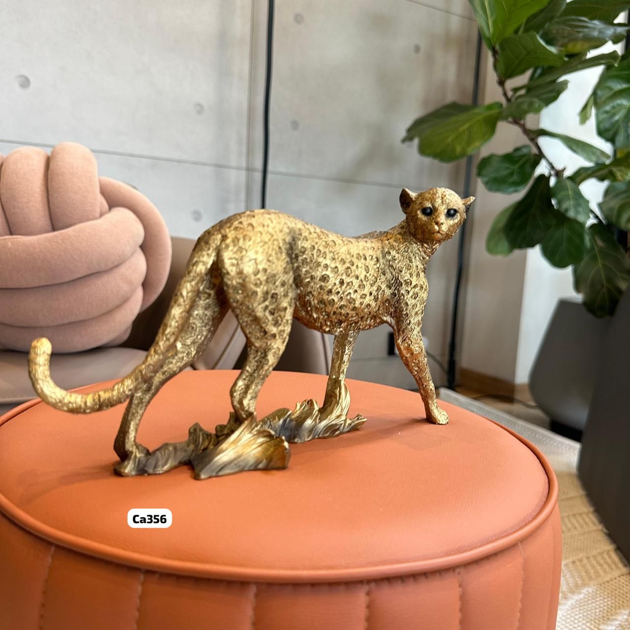Articulo decorativo leopardo dorado caminando 25cm* 7,5cm* 14,5cm