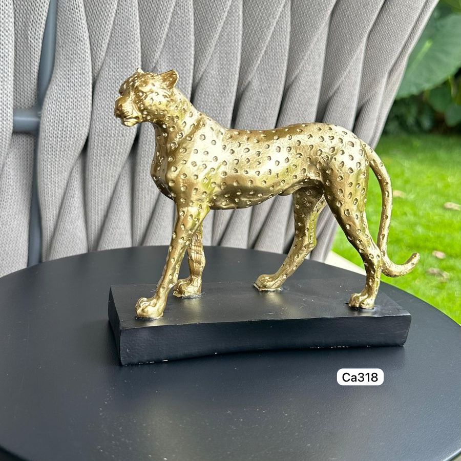 Articulo decorativo leopardo dorado base negro resina 18cm* 6cm* 15cm