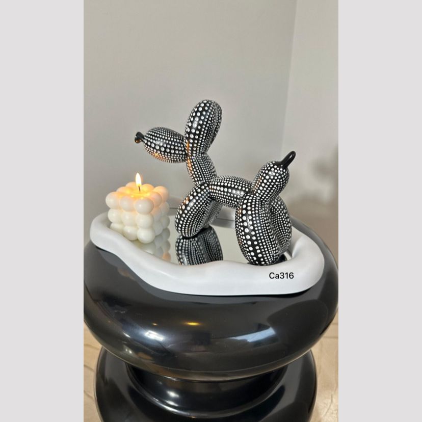 Articulo decorativo perro negro globo resina 18cm* 9cm* 20cm