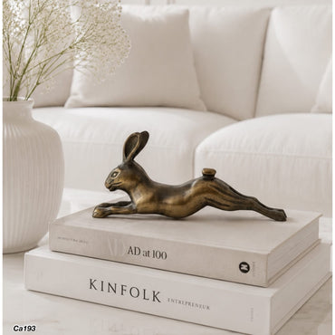 Articulo decorativo conejo en metal dorado 13cm* 7cm* 28cm