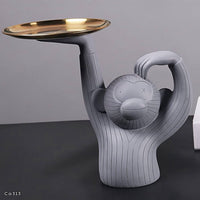 Articulo decorativo mono resina gris bandeja dorada  28,5cm* 14cm* 30cm