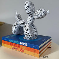 Articulo decorativo perro blanco globo resina 18cm* 9cm* 20cm
