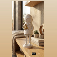 Articulo decorativo astronauta blanco pulpo dorado resina  10cm* 7,5cm* 23cm