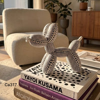 Articulo decorativo perro blanco globo resina 18cm* 9cm* 20cm