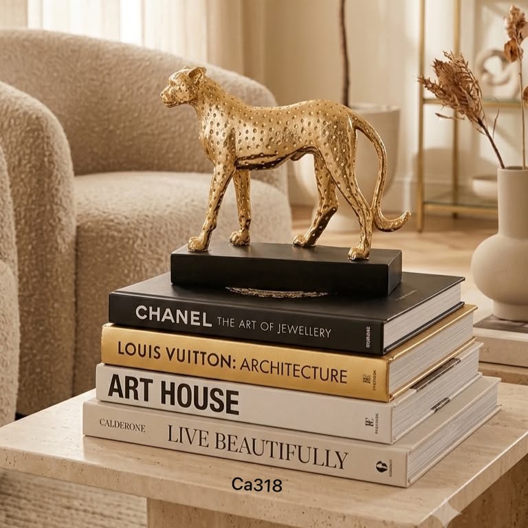 Articulo decorativo leopardo dorado base negro resina  18cm* 6cm* 15cm