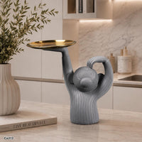 Articulo decorativo mono resina gris bandeja dorada  28,5cm* 14cm* 30cm