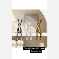 Articulo decorativo conejo plateado pequeño 8cm* 10cm* 21cm