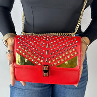 Bolso rojo apliques plateado ojos y cadena dorado  22cm* 9cm* 17cm  C- 23196-1