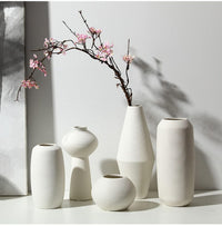 Jarron florero de ceramica blanco en espiral mediano  10cm* 10cm* 20cm