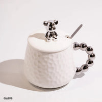 Mugs blanco ceramica detalle oso en tapa manija bolas plateado   430ml