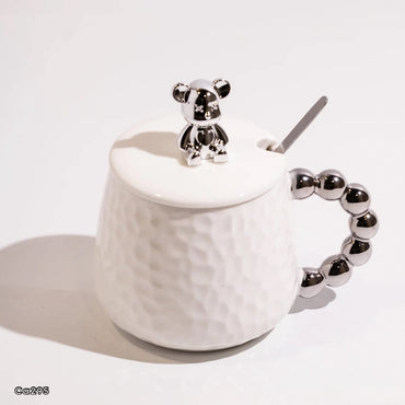 Mugs blanco ceramica detalle oso en tapa manija bolas plateado   430ml