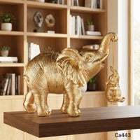 Articulo decorativo elefantes dorado cuerda 16cm* 8cm* 14,5cm