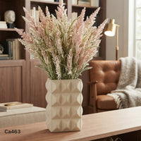 Florero diseño geometrico beige ceramica  13cm* 8cm* 20,5cm