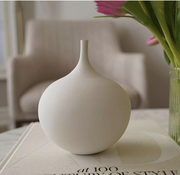 Jarron florero de ceramica blanco ovalado  14cm* 14cm * 17cm