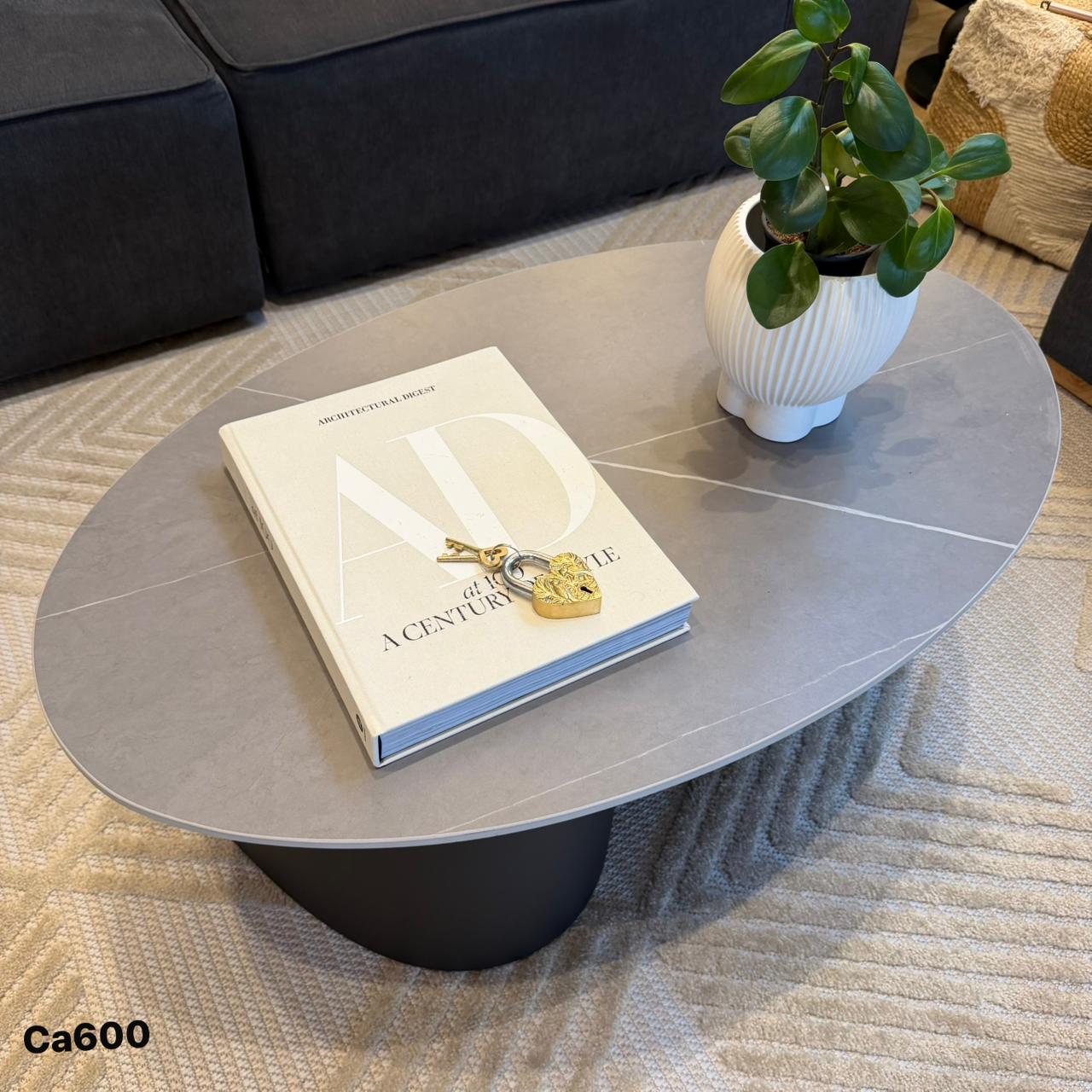 Mesa de centro piedra gris base metal negro 100cm* 60cm* 40cm