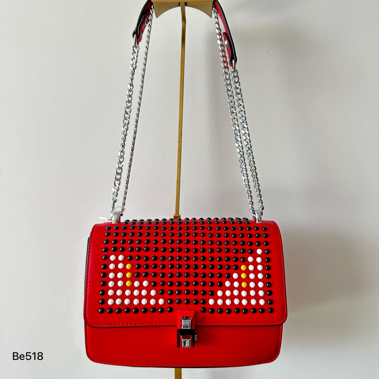 Bolso rojo apliques negro ojos blanco cadena plateado  22cm* 9cm* 17cm   C-23196