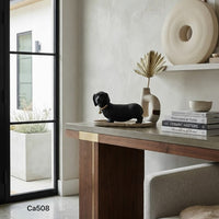 Articulo decorativo perro salchicha negro detalle dorado  22cm* 9cm* 13cm