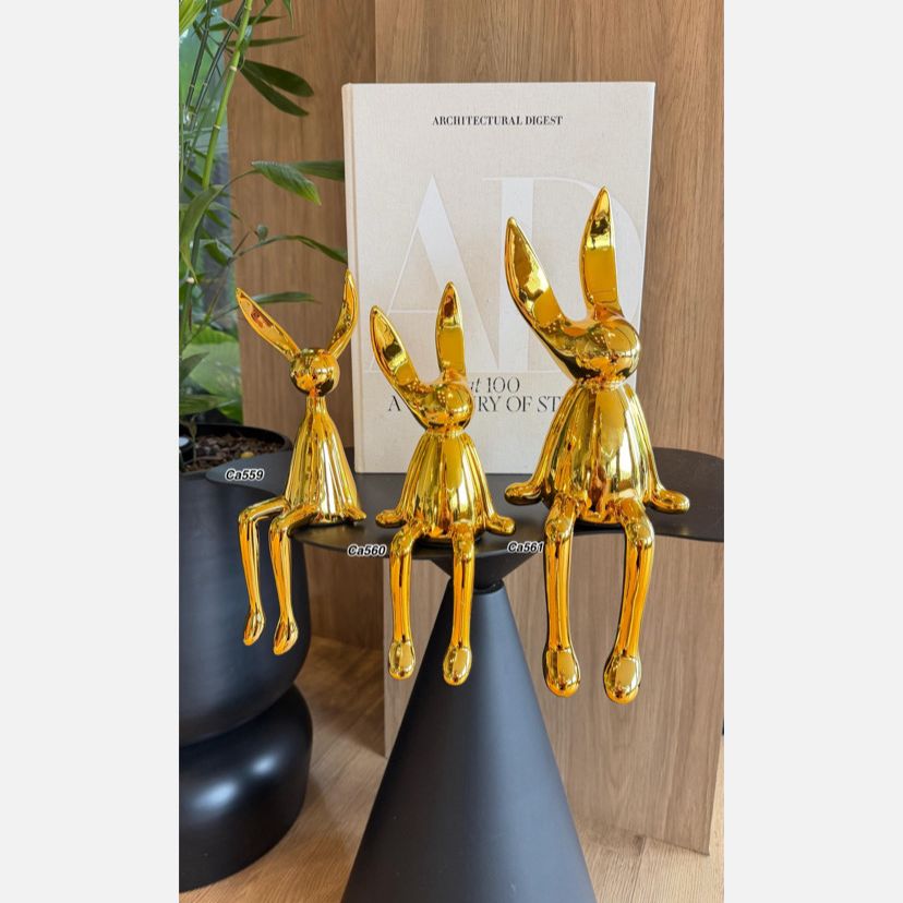 Articulo decorativo conejo dorado grande  14cm* 12cm* 36cm