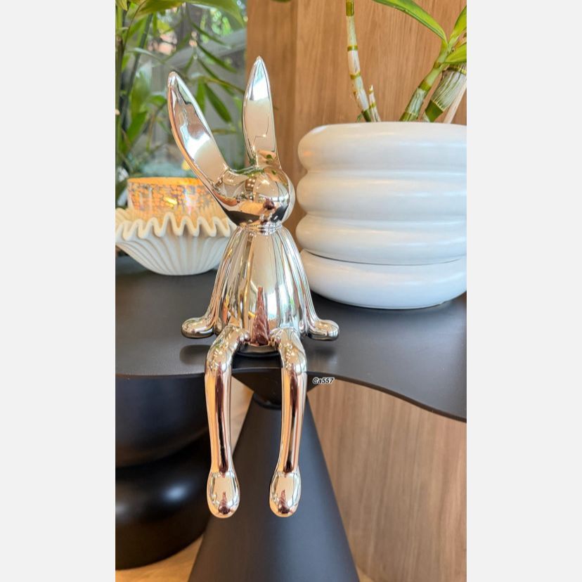 Articulo decorativo conejo plateado mediano  10cm* 10cm* 28cm