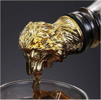 Dispensador de botellas metalico leon dorado  11cm*  3cm