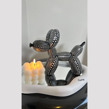 Articulo decorativo perro negro globo resina 18cm* 9cm* 20cm