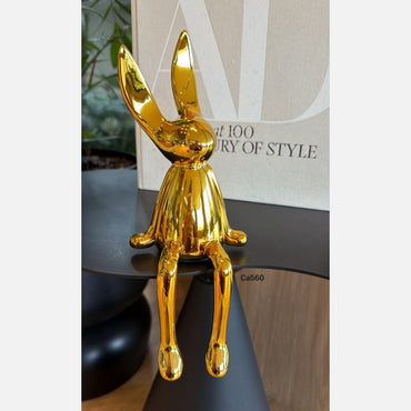 Articulo decorativo conejo dorado mediano  10cm* 10cm* 28cm