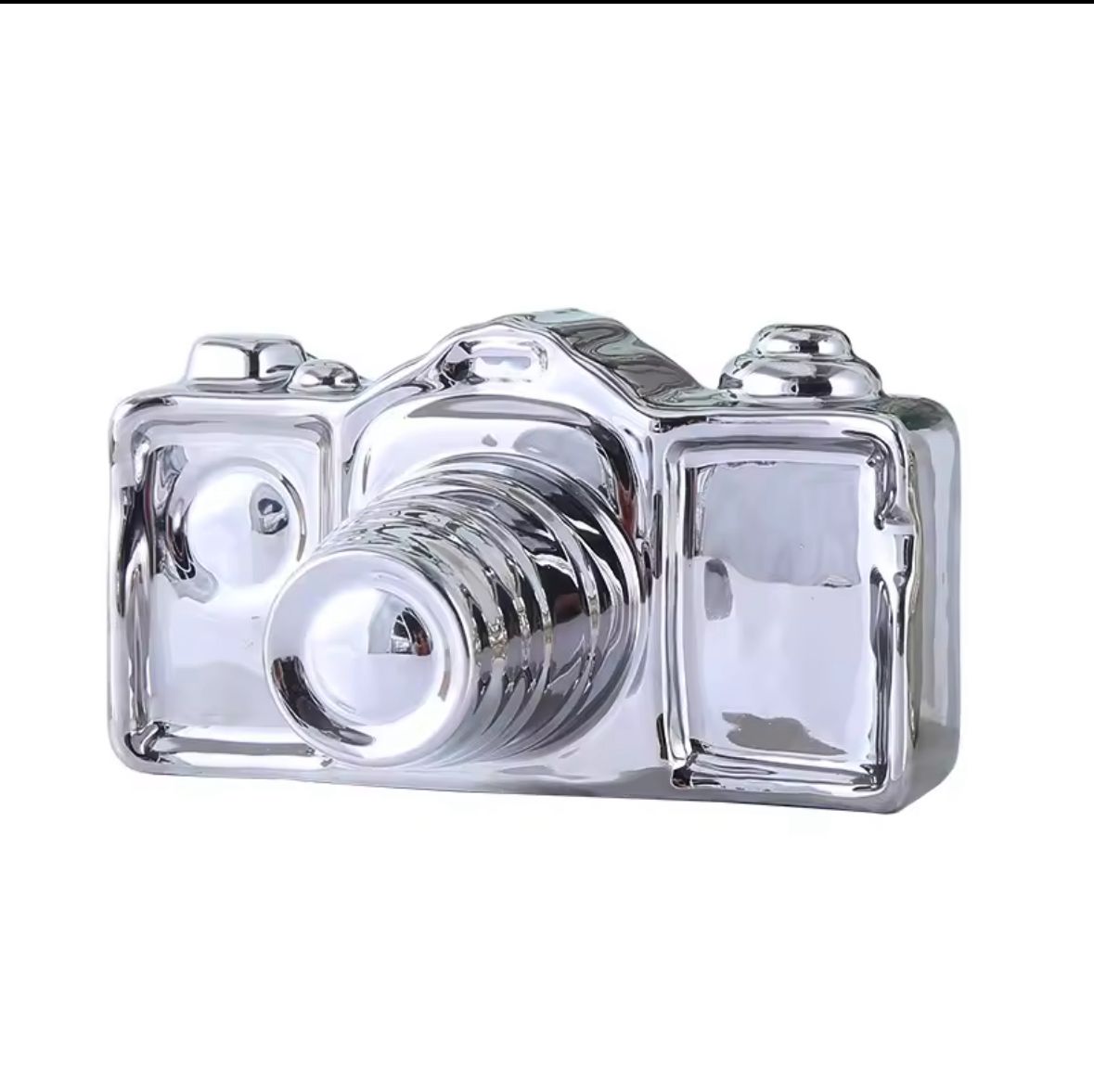 Articulo decorativo camara plateada ceramica  16cm* 11,7cm* 9cm