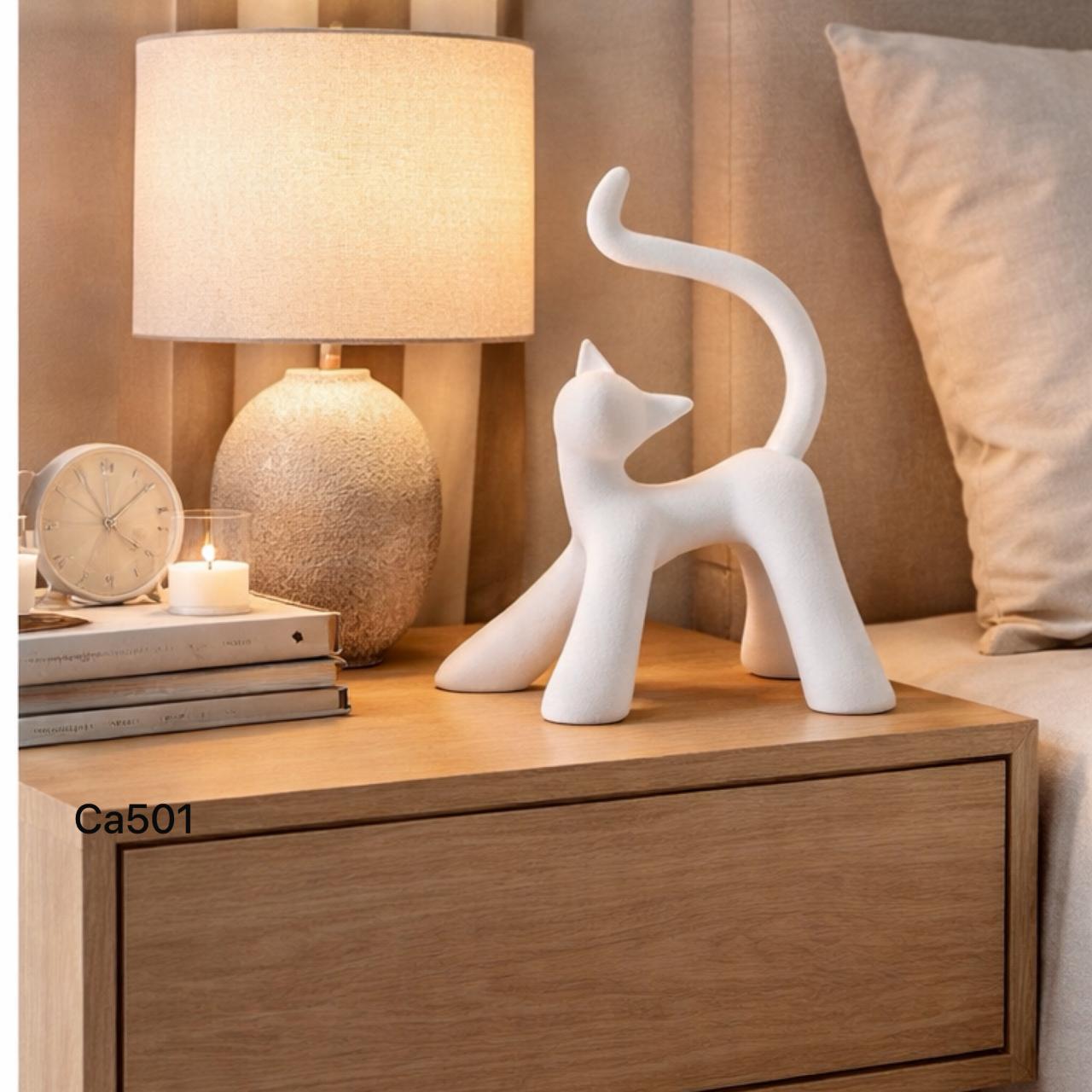 Articulo decorativo gato pequeño gris caminando 18,5cm* 12cm* 20cm