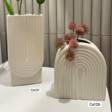 Jarron blanco textura n ceramica  16cm* 9cm* 18cm