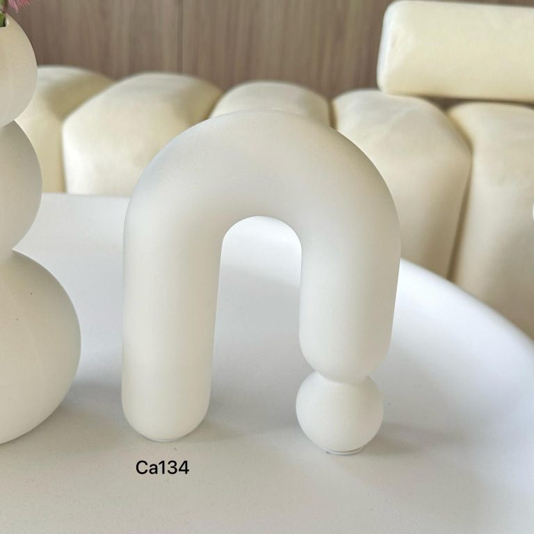 Jarron forma arco ceramica  15cm* 6cm* 9cm