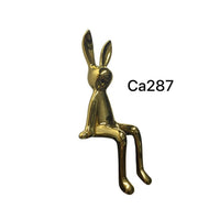 Articulo decorativo conejo dorado pequeño  8cm* 10cm* 21cm