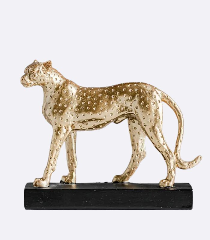 Articulo decorativo leopardo dorado base negro resina  18cm* 6cm* 15cm