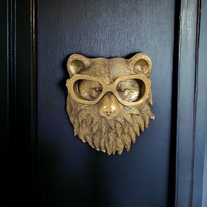 Articulo decorativo oso dorado de pared  16.5cm* 14cm* 7cm