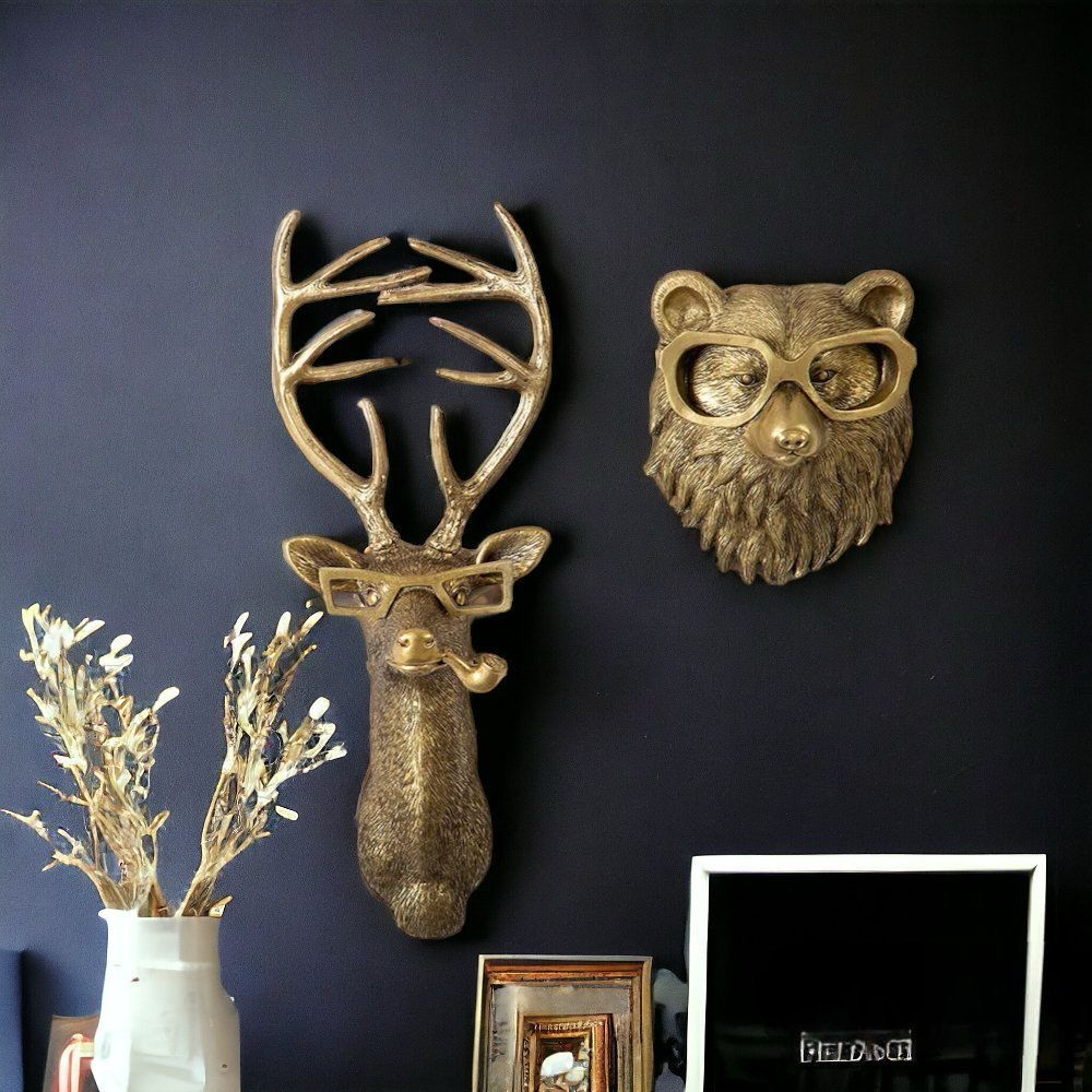 Articulo decorativo oso dorado de pared  16.5cm* 14cm* 7cm
