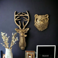Articulo decorativo oso dorado de pared  16.5cm* 14cm* 7cm