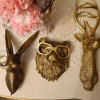 Articulo decorativo oso dorado de pared  16.5cm* 14cm* 7cm