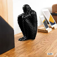 Articulo decorativo figura humano negro resina  8cm* 11cm* 20cm