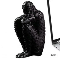 Articulo decorativo figura humano negro resina  8cm* 11cm* 20cm
